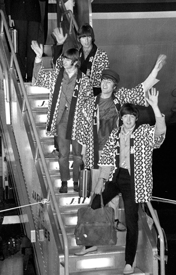 George Harrison, Ringo Starr, John Lennon and Paul McCartney arrive at Tokyo’s Haneda airport on June 29, 1966. | KYODO