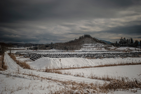 A temporary storage facility for nuclear waste near the city of Iitate-mura, Fukushima Prefecture, where residents were evacuated due to elevated radiation levels. | © James Whitlow Delano