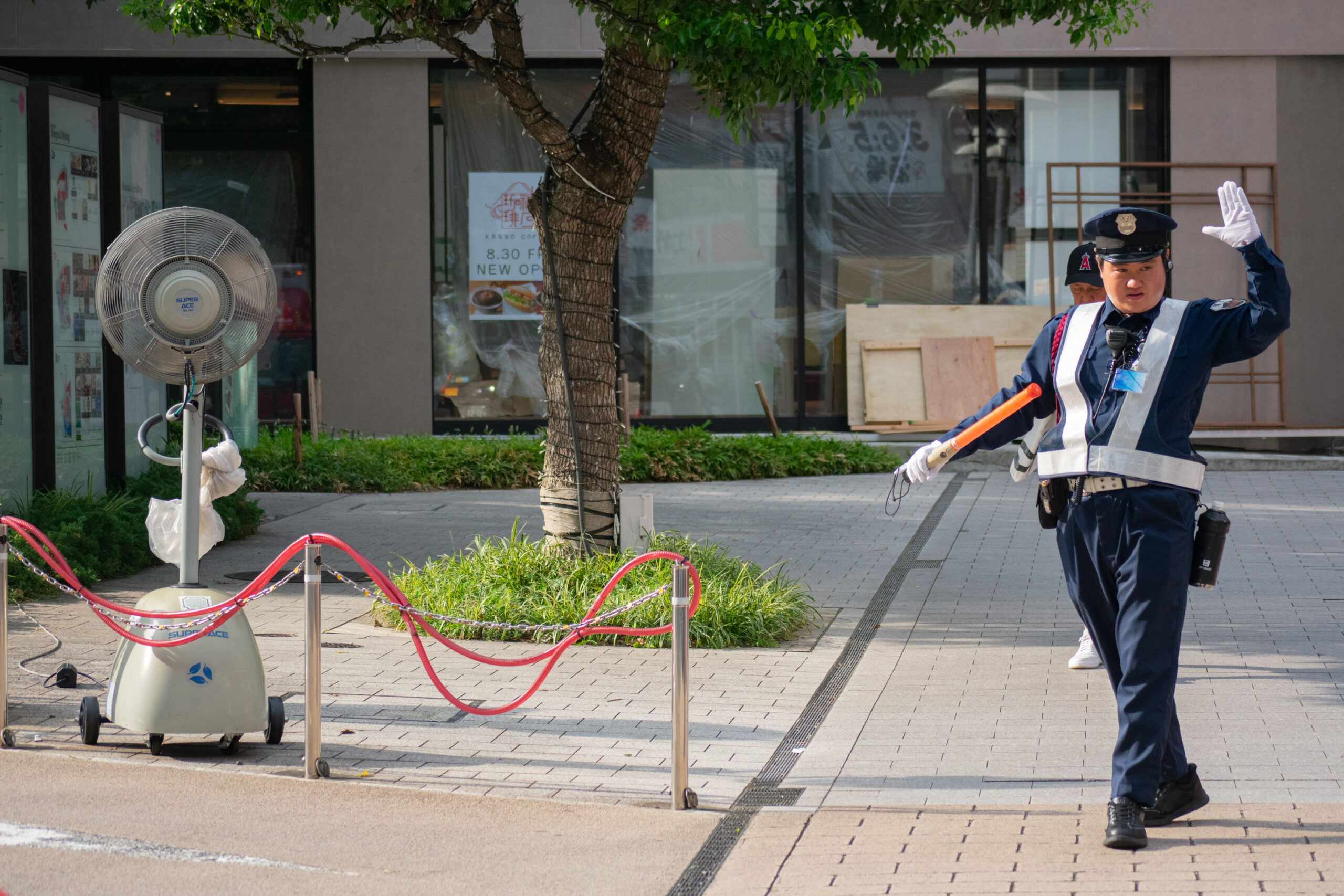 A security guard in Akasaka-Mitsuke, Tokyo, on Aug. 21. The International Labour Organization estimates that by 2030 over 2% of total working hours worldwide may be lost every year due to increased temperatures.